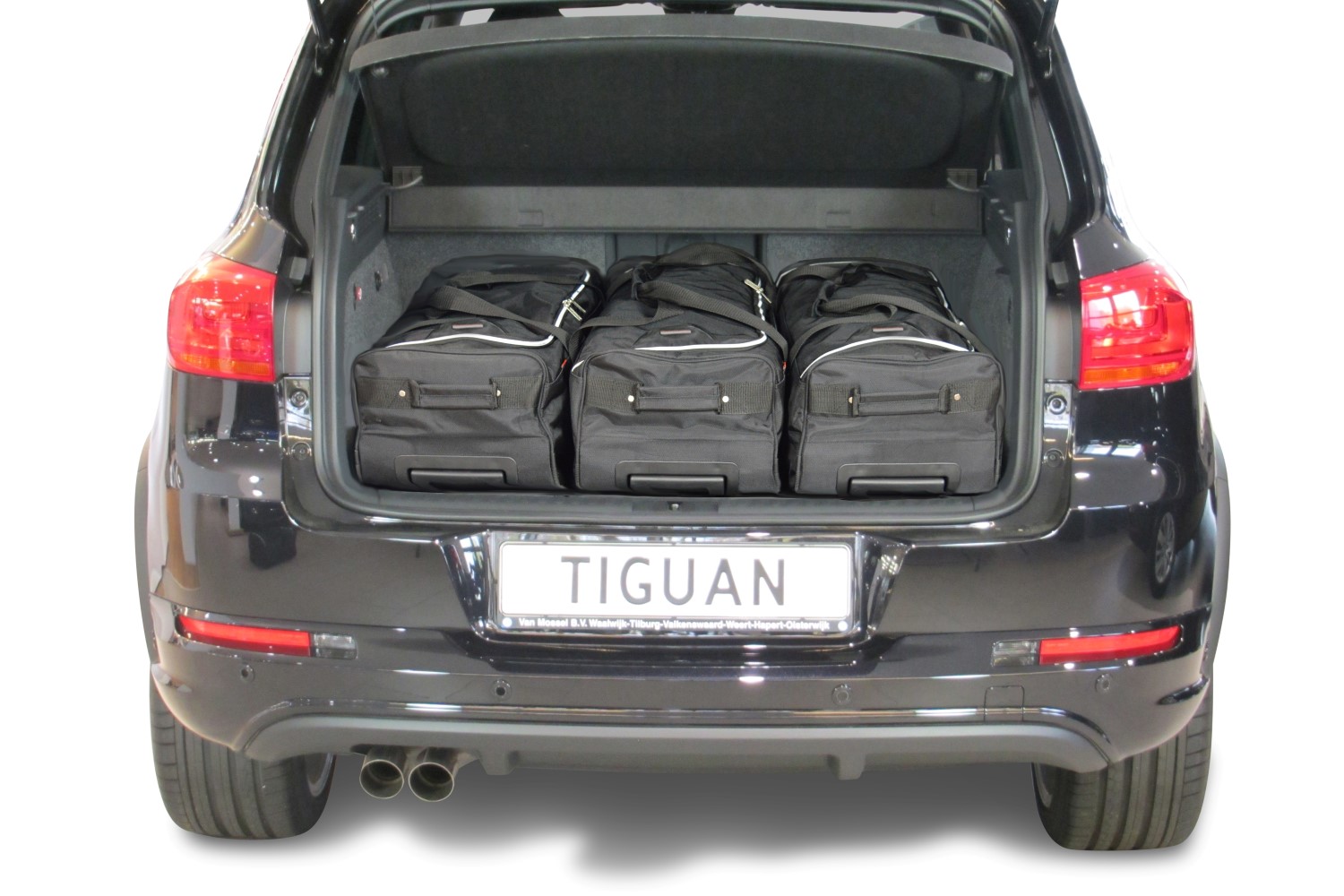 Как открыть багажник фольксваген тигуан